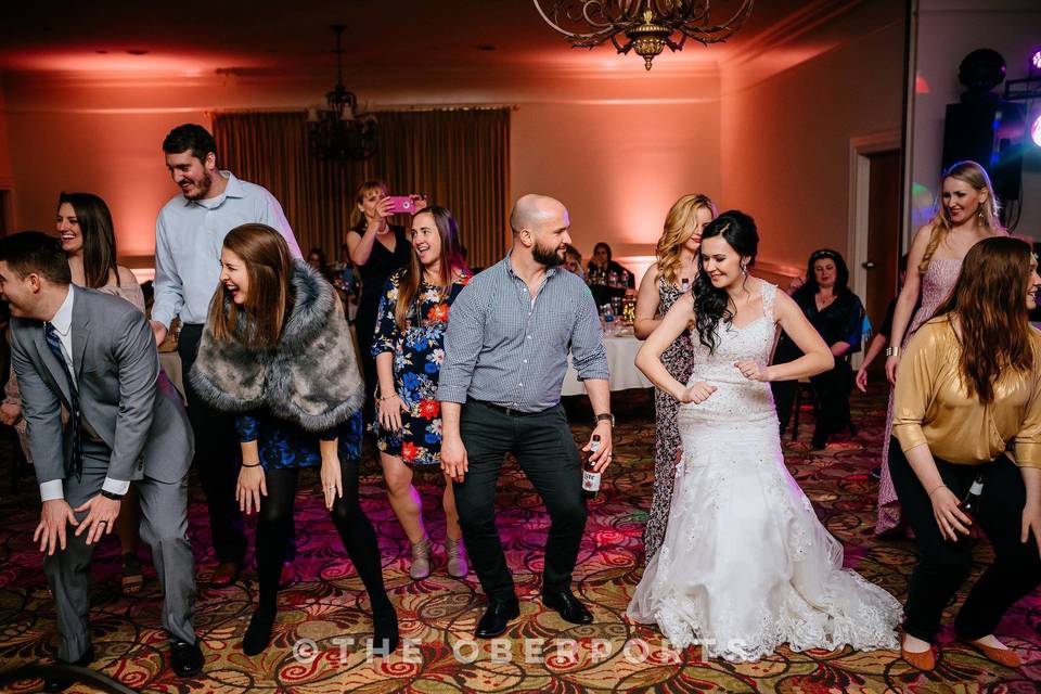 Guests and newlyweds having fun