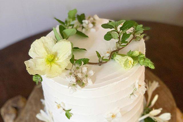 Naked cake with floral embellishments