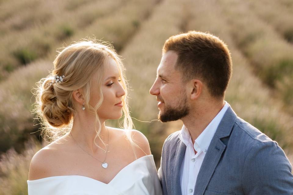 Gorgeous bride on a lavender f