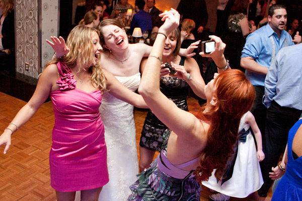 Dancing bride and guests