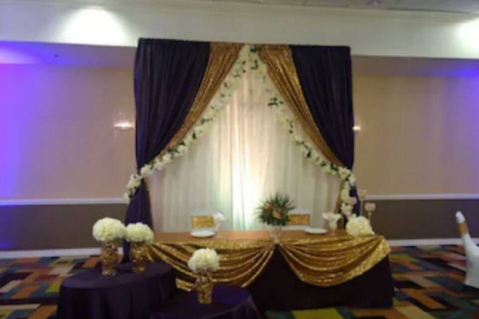 Decadent purple and gold sweetheart table