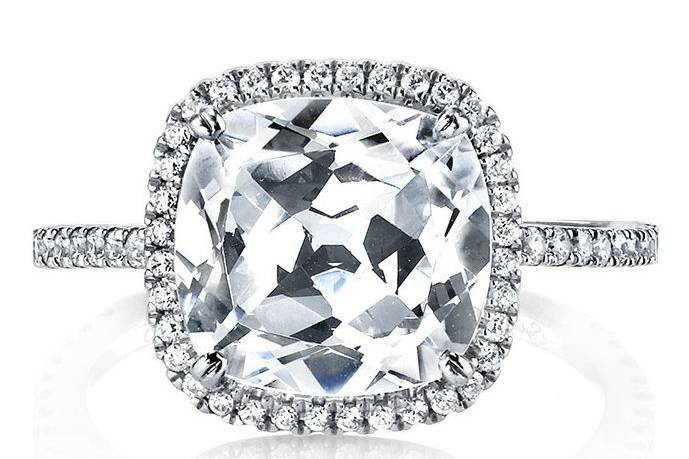 This is a beautiful cushion cut halo engagement ring available at Diamond Exchange Dallas in Dallas, TX.