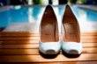 Wedding shoes by pool