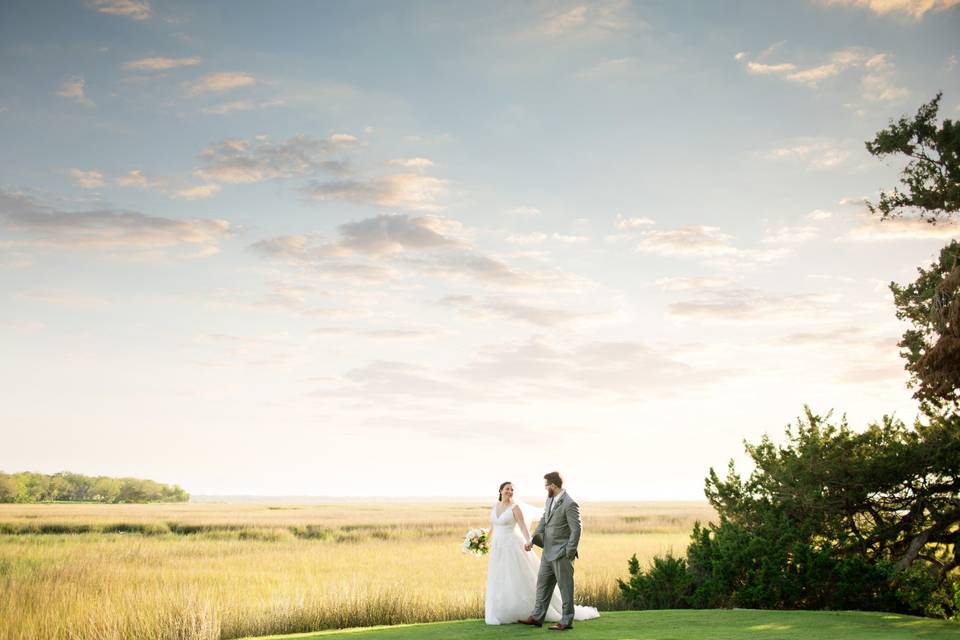 Couple walking on lawn