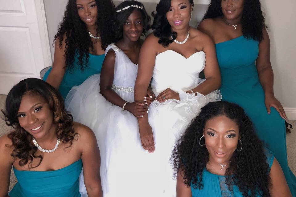 Bride, bridesmaids, and flower girl