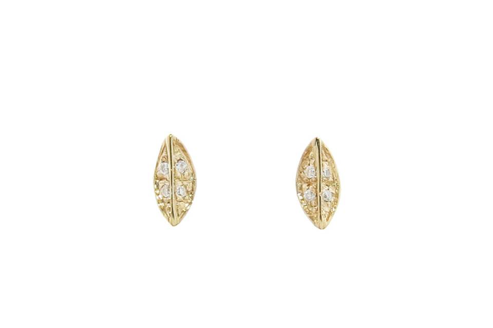 Add these new N+A New York earrings to your everyday stud rotation! Set in 14 karat yellow gold, organic settings hold four diamonds each creating a simple and chic glow. The diamonds total .04 carats. These studs measure 1/4