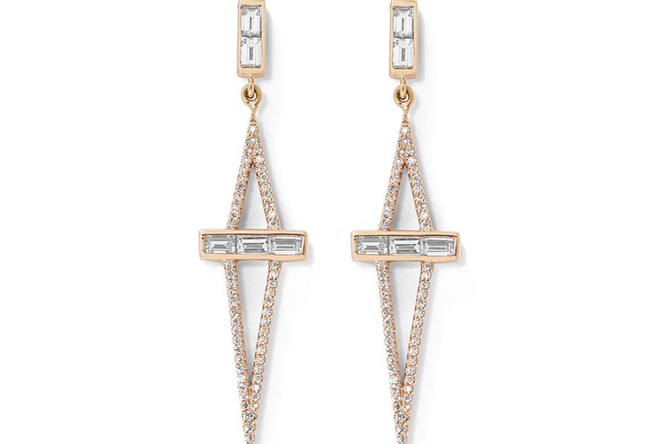 Absolutely stunning from Monique Pean, these long earrings are set in 18 karat recycled rose gold and have the most amazing sparkle. They feature a geometric shape set with pavé and baguette diamonds sharing a total carat weight of 0.75 carats. They measure 1 3/4