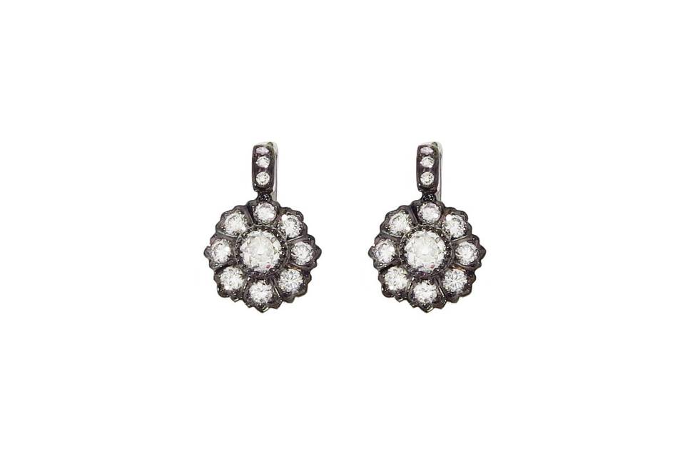 These gorgeous earrings from Sethi Couture have a lovely pop of sparkle in 18 karat white gold with a blackened finished. Scalloped flower drops share a total carat weight 1.04 carats and they have a diameter of 3/8