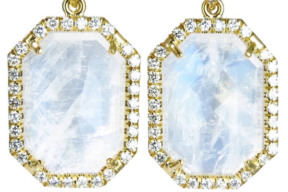 Very sheer with a touch of sparkle, these elegant earrings from Irene Neuwirth are composed of 18 karat yellow gold and oval rose cut rainbow moonstones in hand-notched settings with a pave diamond frame. The earrings have a length of 3/4