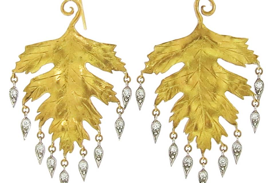 These alluring earrings from Cathy Waterman exude her classic style. Their gold leaves feature wonderful texture and hand detailing, and are sprinkled with platinum and diamond dew drops for incredible movement. The earrings measure 1 3/4