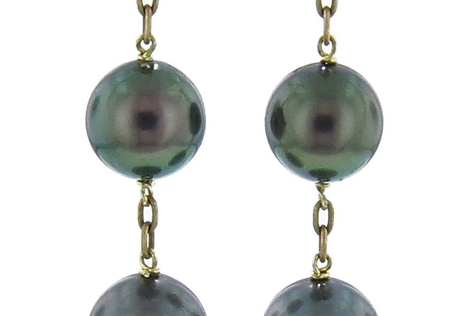 Absolutely stunning from Ten Thousand Things, these double drop earrings are composed of 8mm Tahitian pearls, detailed in 18 karat yellow gold. They measure just under 1