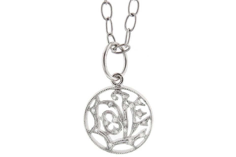 We think the Baby Love is so adorable that several of us at Ylang 23 have purchased one for ourselves! In platinum scattered with diamonds, the love pendant measures 5/8