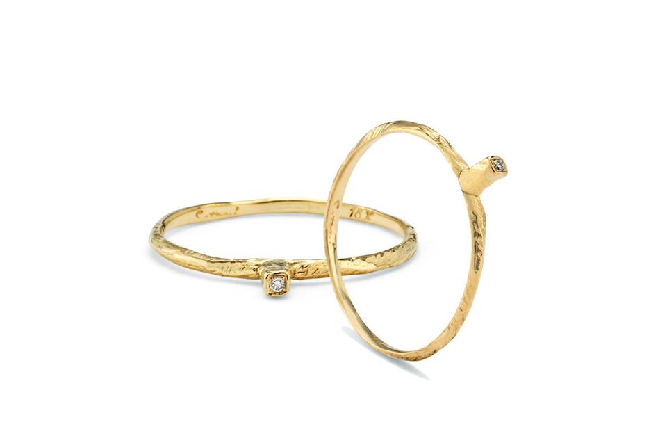 Each ring from designer Satomi Kawakita is handmade with impeccable precision. This tall bezel band, crafted from 18 karat yellow gold, is no exception. Detailed and lovely in a ring stack.