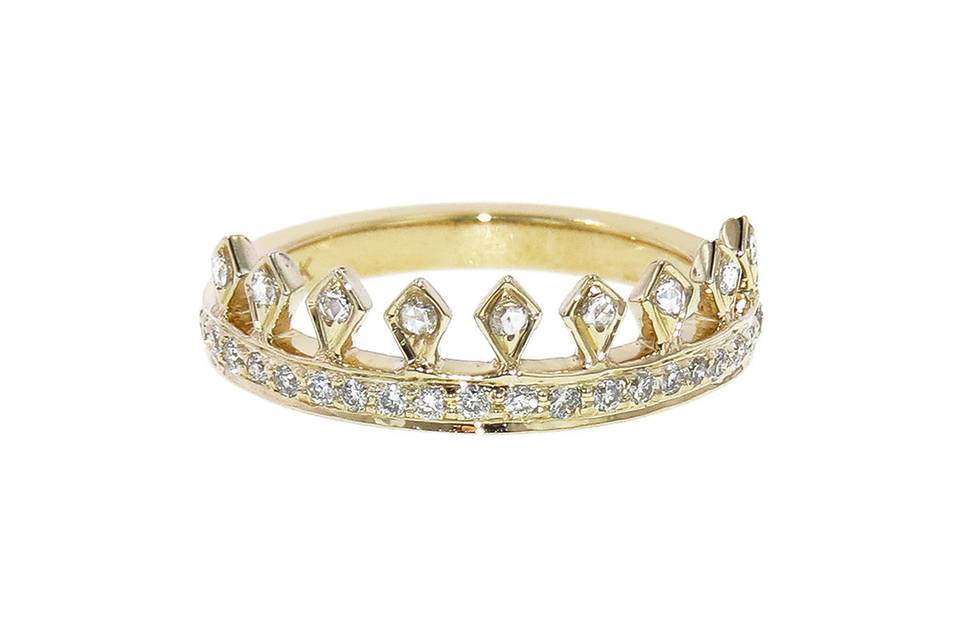 Feel like royalty in this stackable Enchanted Garden Crown Ring from designer Sethi Couture. Tiny diamonds are set on the front of the 18 karat yellow gold band and on each of the points of the crown. The ring has .28 total carat weight. Who wouldn’t want to wear a crown everyday?