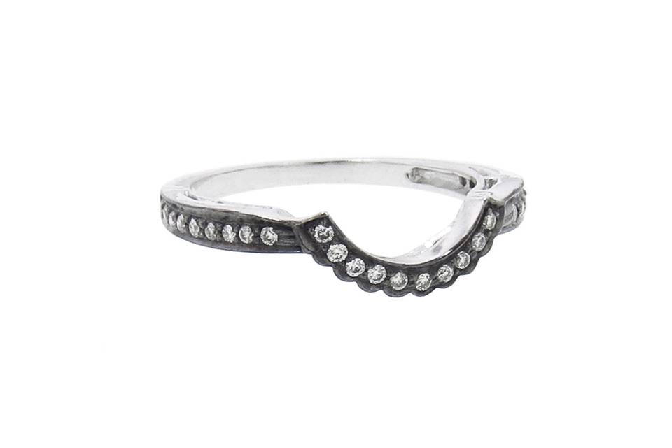 Diamonds set with heirloom style. From designer Sethi Couture in black rhodium over 18 karat gold, this True Romance Band features tiny white diamonds throughout and perfectly hugs the True Romance Diamond Ring. The ring is .17 total carats.