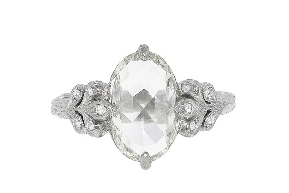 This leafside ring has a beautifully rose cut moghul diamond with a carat weight of 2.15 carats and a clarity of VS2. Designer Cathy Waterman has lovingly prong set this diamond in platinum with bright sparkling diamonds, flanked by diamond leaves, resting on a textured bark band. Size 6 3/4 and is sizable.