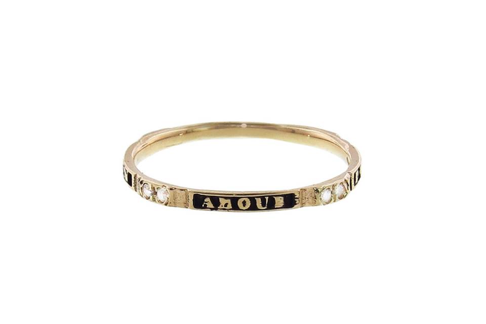 Set in 14 karat yellow gold this delicate band from Tilda Biehn is a timeless treasure. This ring has a romantic declaration, 