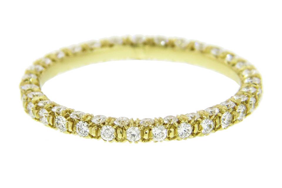 This gorgeous band from Finn is quite the stunner with three rows of bright pave diamonds set in 18 karat yellow gold. Size 6 1/2 available for immediate delivery.