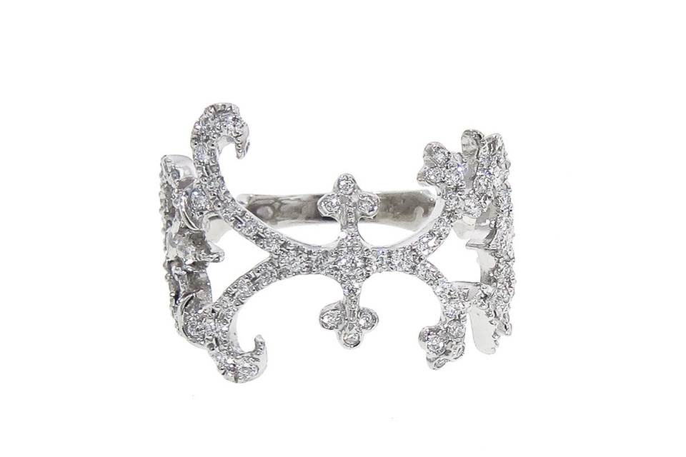 This stunning band from Kataoka is composed of 18 karat white gold, a brilliant display of sparkle with a webbed design that screams romance. The scalloped detail is set with pave diamonds that total .55 carats and the band measures 5/8