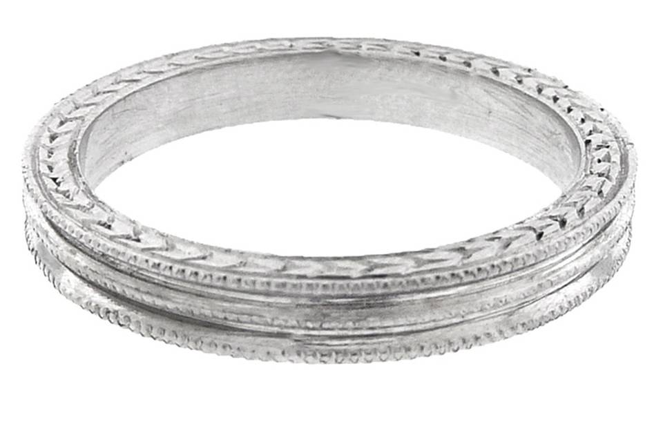 This elegant ring by Cathy is cast in solid platinum and makes a brilliant addition to your stack. The band measures 1/8