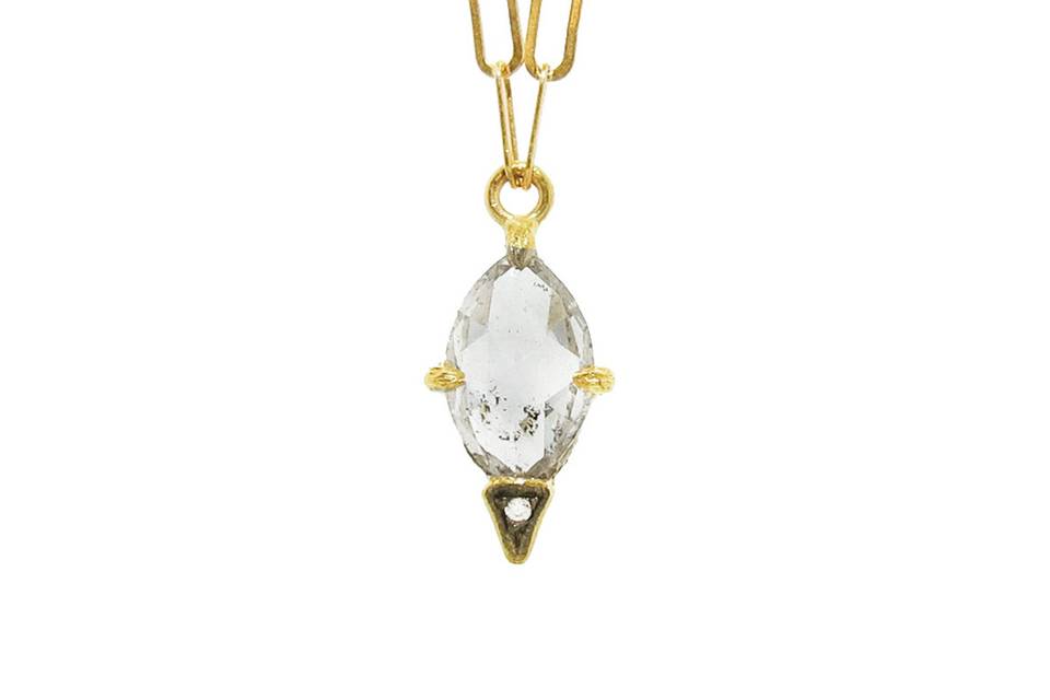 This exquisite necklace from Cathy Waterman unites handcrafted artistry and easy-to-wear versatility. Set in 22 karat gold, this pendant features a silver rose cut marquis diamond that is sure to dazzle every room. The diamond totals .95 carats and is set in a diamond-tipped blackened gold setting. The pendant hangs from Cathy's 16