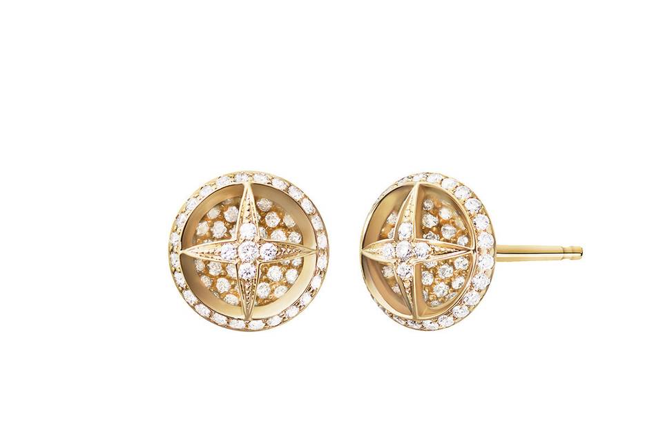 Instantly elevate your out-to-dinner ensemble with these gorgeous studs from Melissa Kaye. Crafted in 18 karat gold these earrings feature a cut out star detailed and framed in white diamonds. The diamonds total .38 carats. The studs measure 5/16