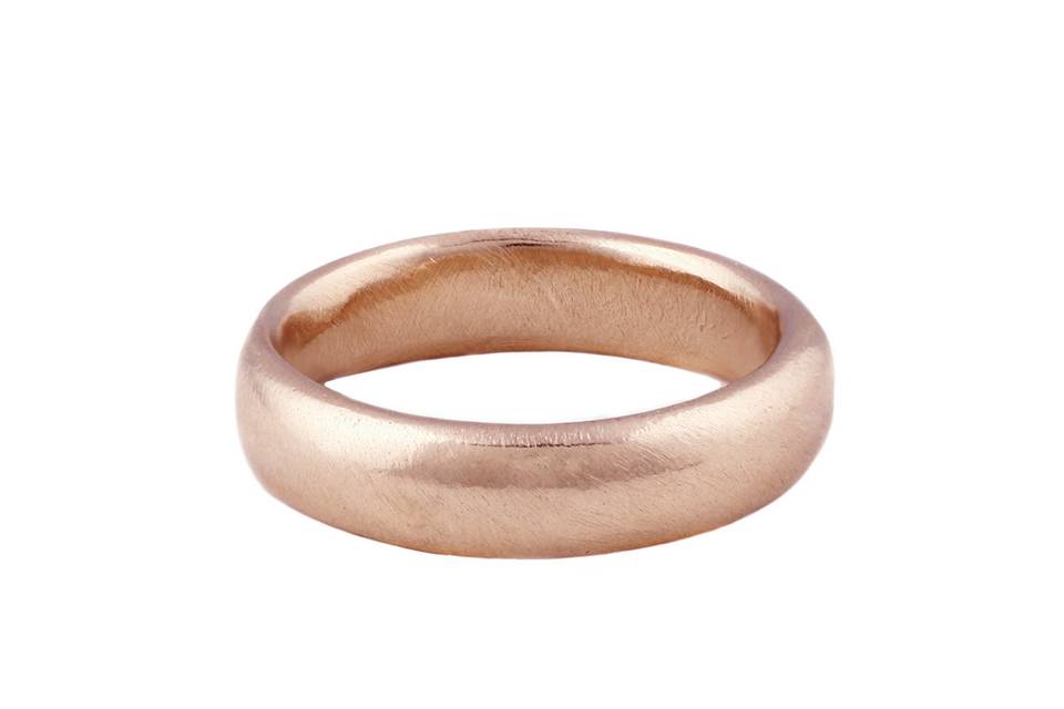 A timeless look that will never go out of fashion, this band from Lauren Wolf is an ideal wedding band. This half round band has high shine and is finished with light texture detailing. A versatile ring for both men and women.
Crafted in 14 karat rose gold.
Also available in 14 karat yellow gold.
Handcrafted in California.