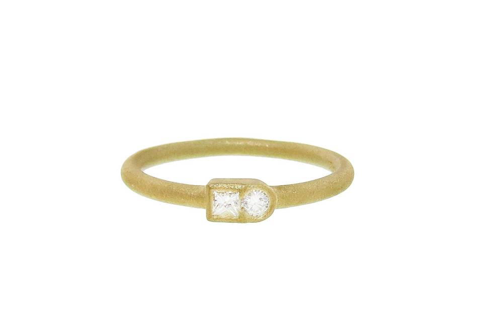A sweet addition to your everyday stack! This delicate ring from Tate features a square and circle diamond fused together and bezel set in gold. Finished with a thin gold band. Pair this ring with Tate's other unique rings for a fun stack.