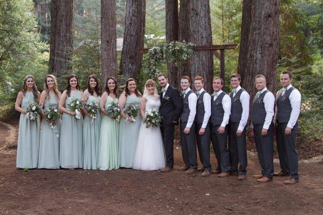 The couple with the bridesmaids and groomsmen