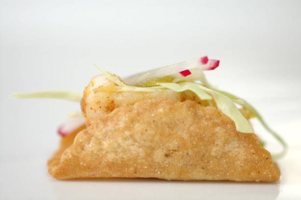 Wild Sea bass mildly seasoned served in a hand crafted mini taco