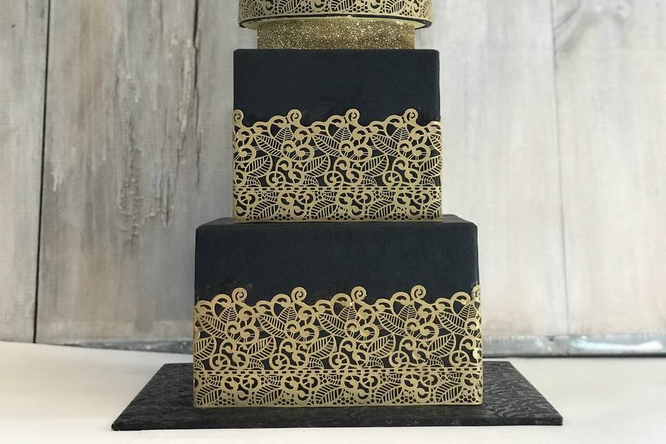 Black and gold lace cake