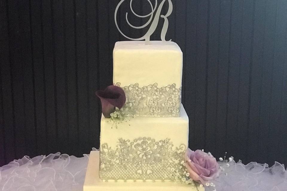 Silver and white lace cake