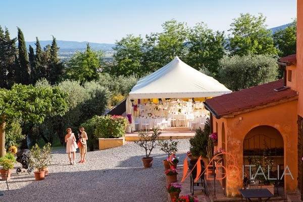 An open-air wedding reception in Tuscany.