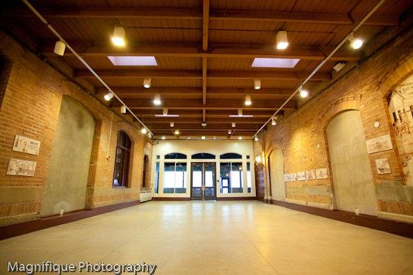 forest green accented metal beam structure with stamped concrete tile flooring enhance the original postal platform of Union Station. Popular for wedding receptions up to 150, banquets up to 180 and meetings up to 200.Taken by Terra Cooper from Magnifique Photography. http://www.magnifiquephotography.com