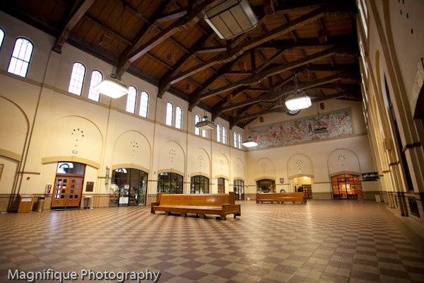 BREEZEWAYLocated at the north entrance of Union Station the Breezeway is the foyer of the Theater Annex, Browning Theater and Car Museum. Available for rental when adjacent room is rented. Popular for evening weddings (after 5pm only , up to 120 guests) with reception in the Theater Annex or Browning Theater.Taken by Terra Cooper from Magnifique Photography. http://www.magnifiquephotography.com