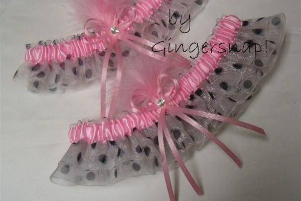 Mon Cherie' Bridal Garter Set ~ Created from sheer white organza riddled with black polka dots. A pink satin band a fun pouf of marabou feathers completes the look.