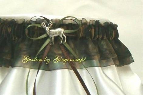Sheer Camo Love Bridal Garter Set ~
Made from sheer camo print
organza material and a satin camo print ribbon band with a deer charm.