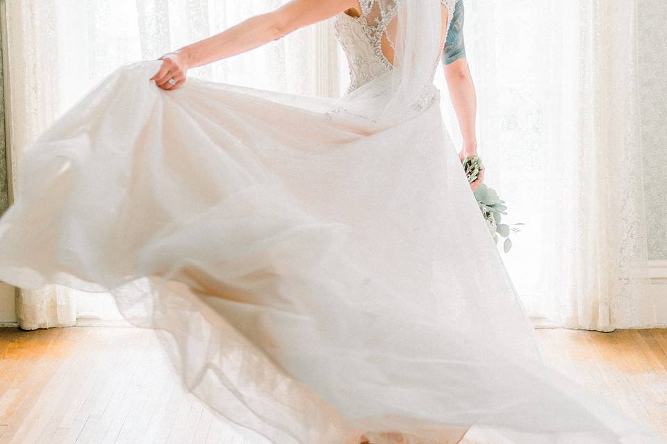 Bride twirling dress