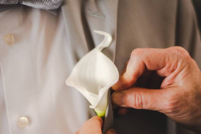 Pinning the boutonniere