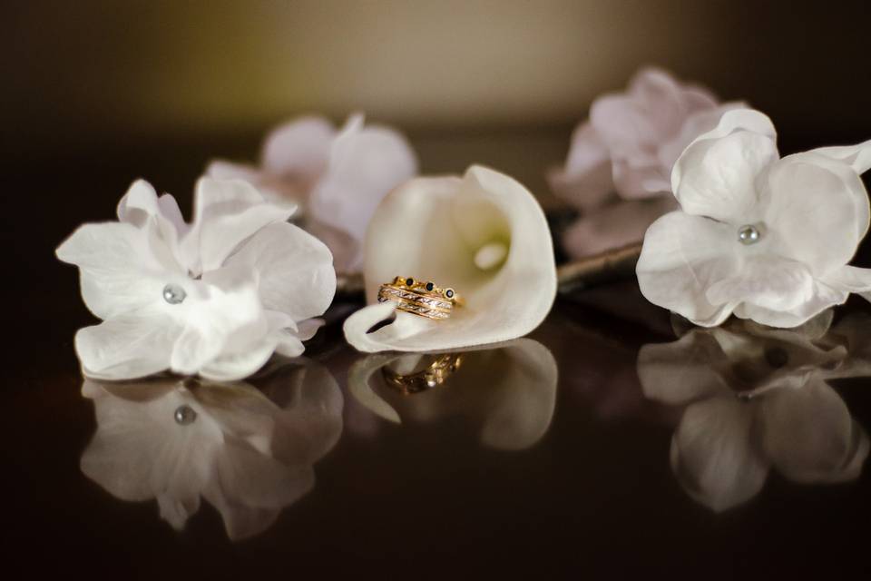 Wedding rings on boutonniere