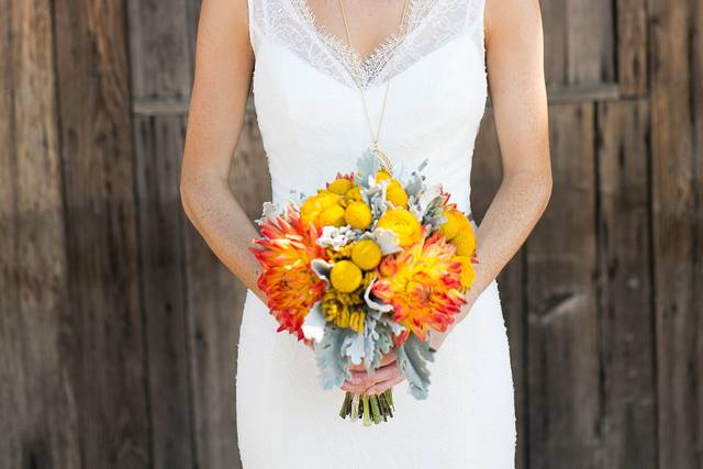 Marie - sheer illusion v-neck lace wedding dress with cap sleeves by Trish Lee Bridal San Francisco in custom Chantilly lace. Photo: Jesse Leake
