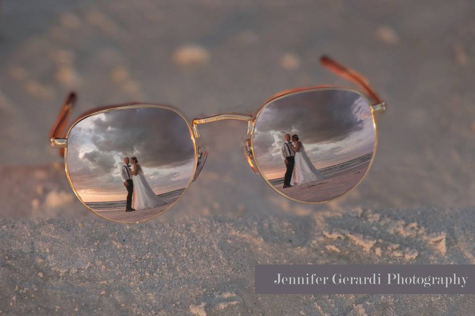 Reflection of couple kissing