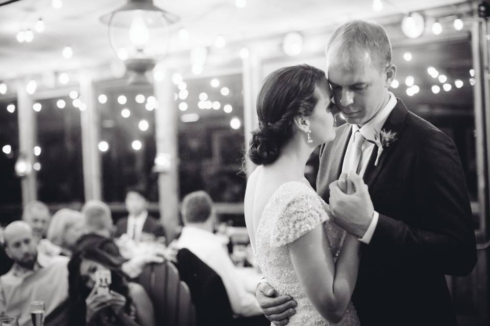 Groom holding his bride