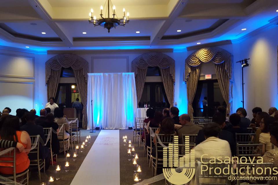 Our pretty draping/uplighting
