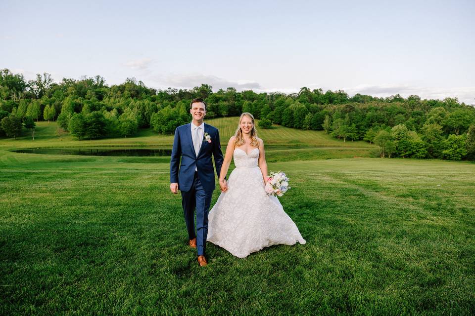 Couple strolling on lawn