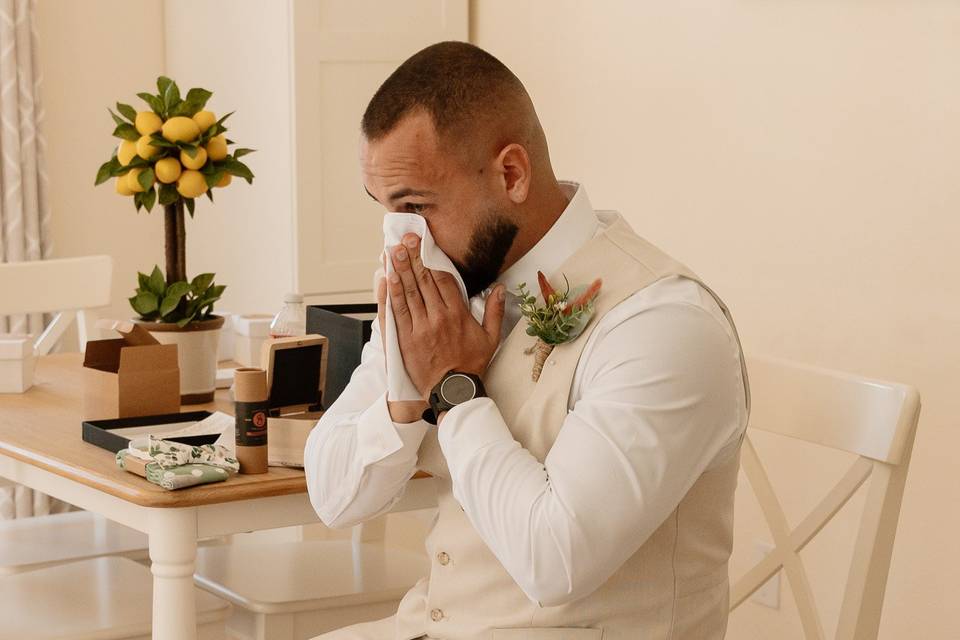 Groom crying after opening gif