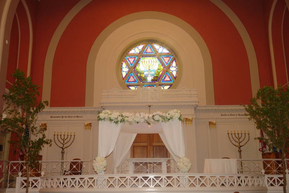 Our chuppah (minus the flowers) is included in the rental package