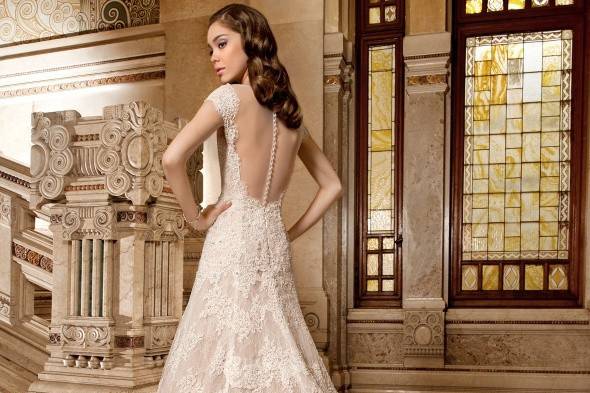 Beautiful lace gown by Demetrios in our store!