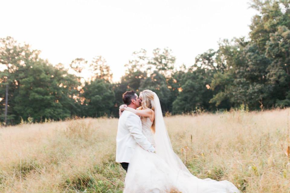 Couple's portrait in the field