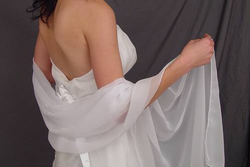 Long white chiffon wedding wrap. Beautiful and elegant. Covers your arms up and not to much of your dress.